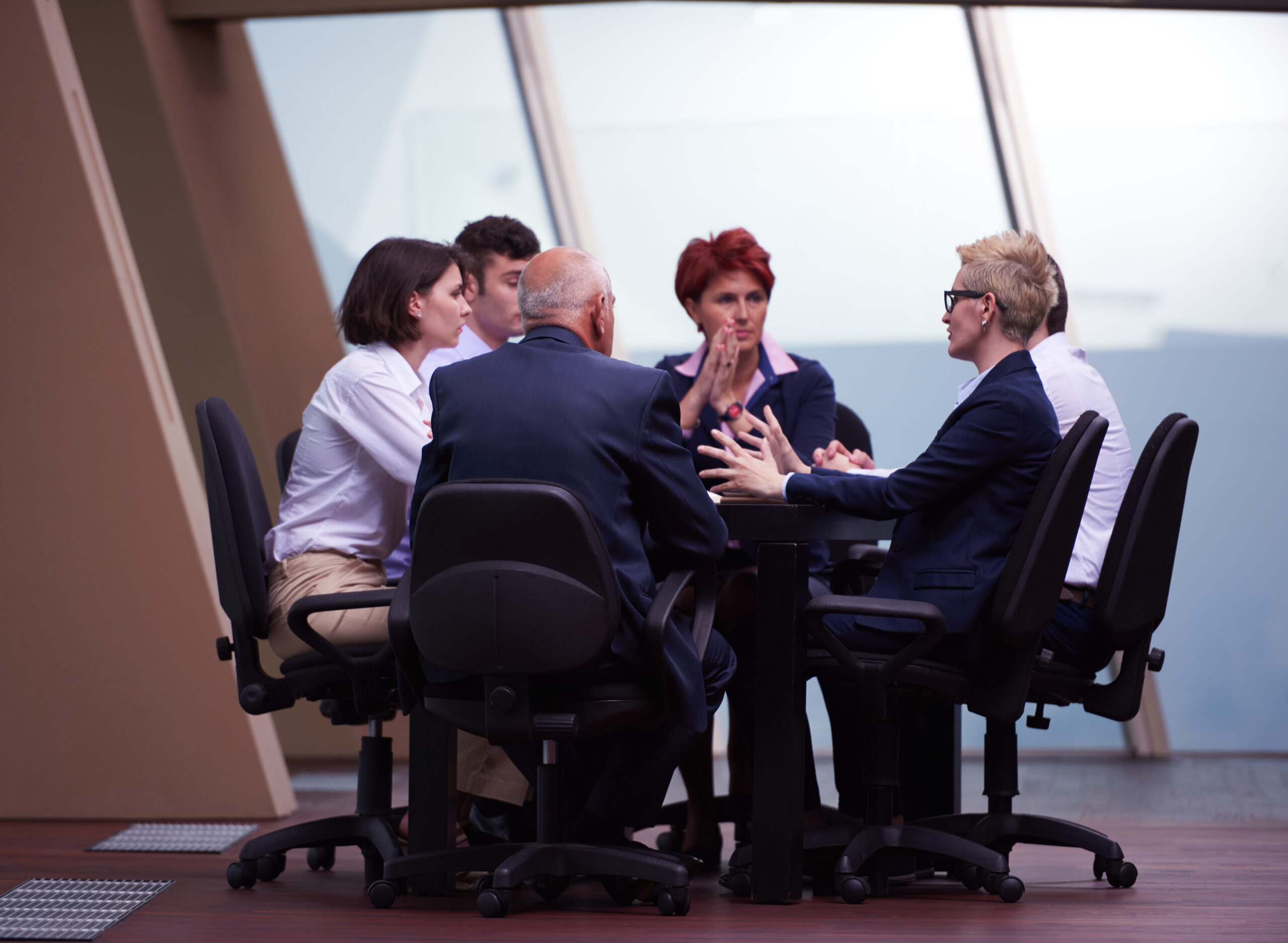 startup business people group have meeting in modern bright office interior, senoir investors  and young software  developers